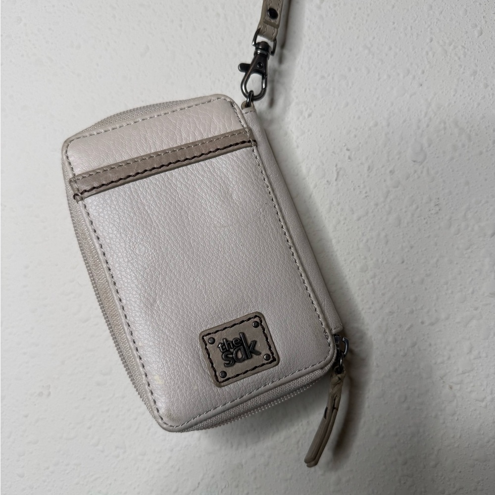 The Sak Iris Stone Sparkle‎ Cellphone Wristlet Wallet two stains